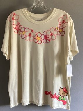 Hello Kitty Cream Short Sleeve Tee w/ Pink & Yellow Floral Lei Hawaii Exclusive